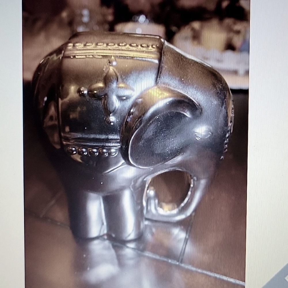Port to Port metallic silver over ceramic chrome look elephant figure 7" high